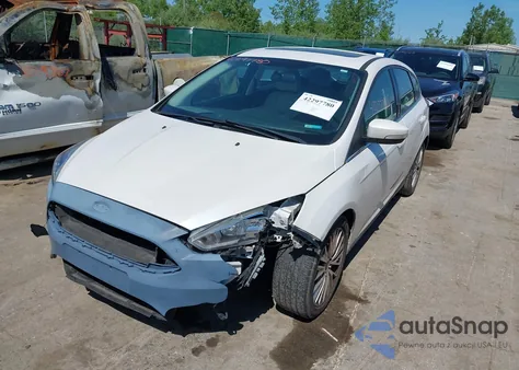 2018 Ford Focus Titanium z USA, uszkodzony, nr VIN 1FADP3N24JL279449